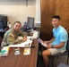 Staff Sgt. Lori Lawson talks to Stephen Burger, a student at Eastern Kentucky University about joining the Guard. . (Courtesy photo)