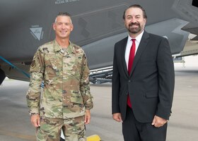 Mark Brnovich, right, Arizona Attorney General, and Brig. Gen. Gregory Kreuder, left, 56th Fighter Wing commander, pose for a photo in front of an F-35A Lightning II during a base visit Aug. 20, 2021, at Luke Air Force Base. Brnovich toured various places around base to include the 56th FW Headquarters, F-35 Academic Training Center, and the 62nd Fighter Squadron. Brnovich toured base and met with wing leadership to observe Luke’s mission of training the world’s greatest fighter pilots and combat-ready Airmen. (U.S. Air Force photo by Staff Sgt. Collette Brooks)