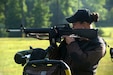U.S. Army Sgt. Amanda Elsenboss prepares to fire her M16 during the 53rd Annual Interservice Rifle Championship hosted by Weapons Training Battalion, Marine Corps Base Quantico, Va., July 7, 2014. This was the 45th match held since the competition was disrupted in 1968 and 1969 due to a shortage of personnel. (U.S. Marine Corps photo by Cpl. Daniel Benedict/Released)