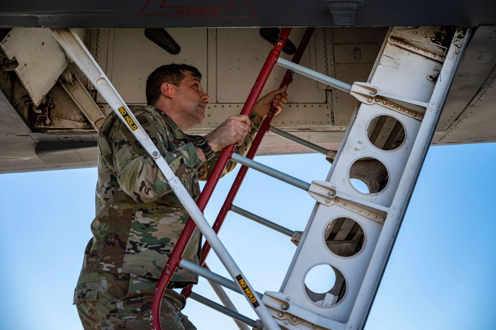 Maj. Gen. Andrew Gebara, 8th Air Force and Joint-Global Strike Operations Center commander, climbs into a B-1B Lancer at Dyess Air Force Base, Texas, Aug. 23, 2021. As the commander of the 8th Air Force and J-GSOC, Gebara presides over the entire bomber inventory and oversees the Service’s airborne nuclear command and control assets. (U.S. Air Force photo by Senior Airman Colin Hollowell)