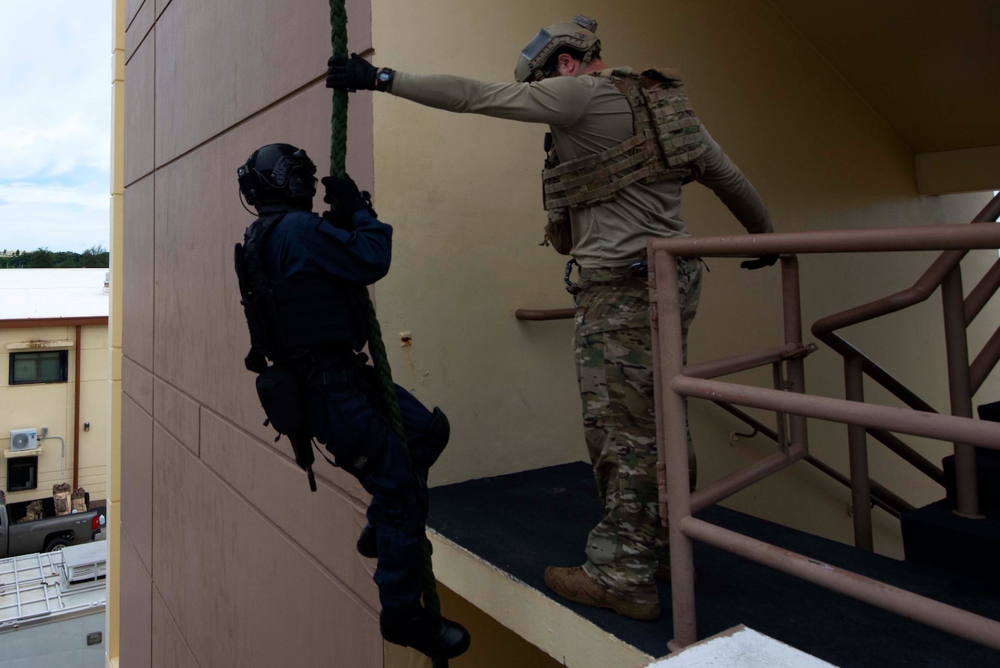 A U.S. Naval Special Warfare operator holds a rope for a Japan Maritime Self-Defense Force sailor as part of MALABAR 2021. MALABAR 2021 is an example of the enduring partnership between Australian, Indian, Japanese and American maritime forces, who routinely operate together in the Indo-Pacific, fostering a cooperative approach toward regional security and stability. Naval Special Warfare is the nation’s premiere maritime special operations force and is uniquely positioned to extend the Fleet’s reach and deliver all-domain options for naval and joint force commanders.