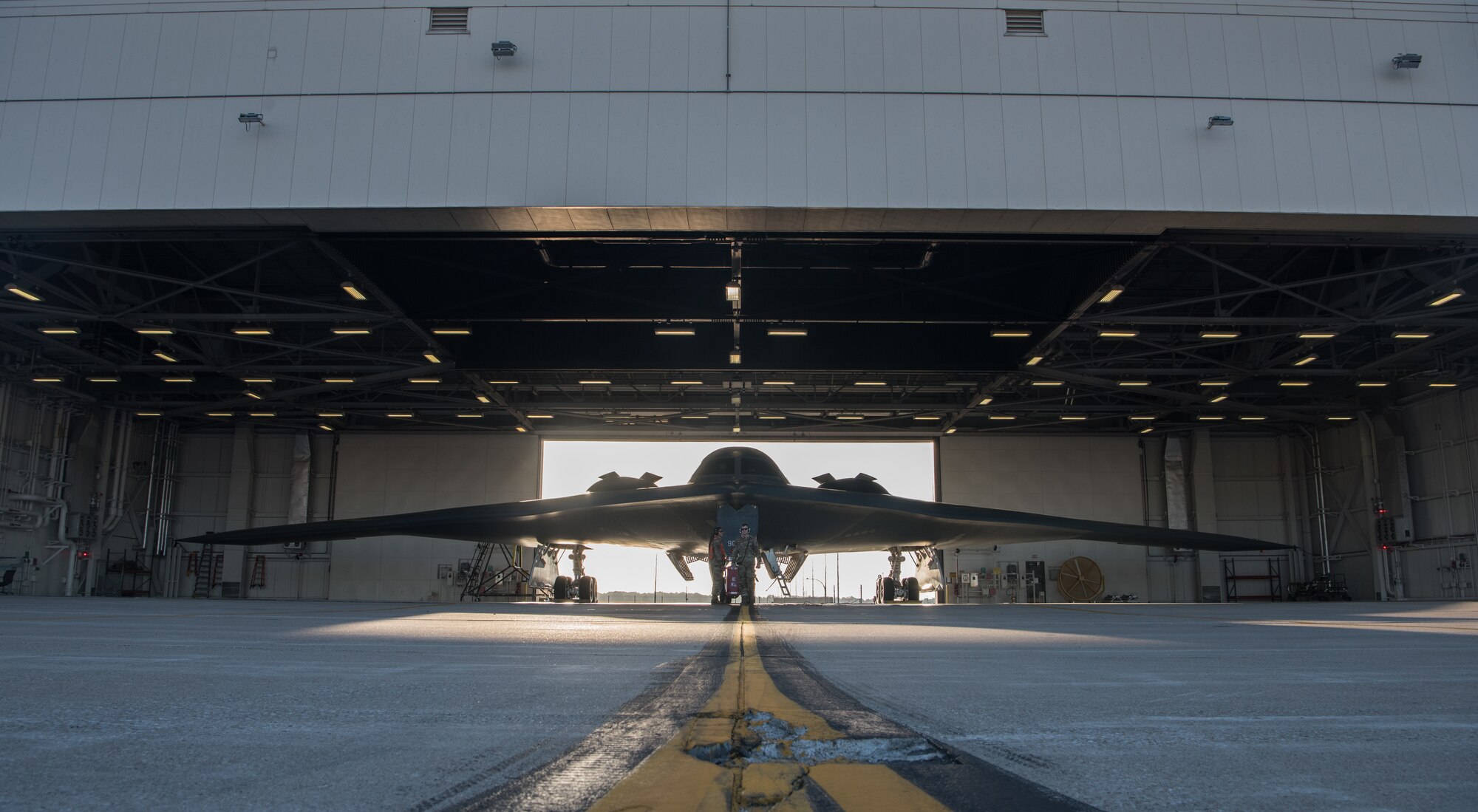 U.S. Air Force B-2 Spirit crew chiefs with the 509th Aircraft Maintenance squadron prepare a B-2 Spirit for takeoff at Whiteman Air Force Base, Missouri, Aug. 23, 2021. Thanks to its nearly 6,000-mile unrefueled range, the B-2 is capable of expediently delivering massive fire power anywhere on the globe through the most challenging enemy defenses. (U.S. Air Force photo by Senior Airman Parker J. McCauley)