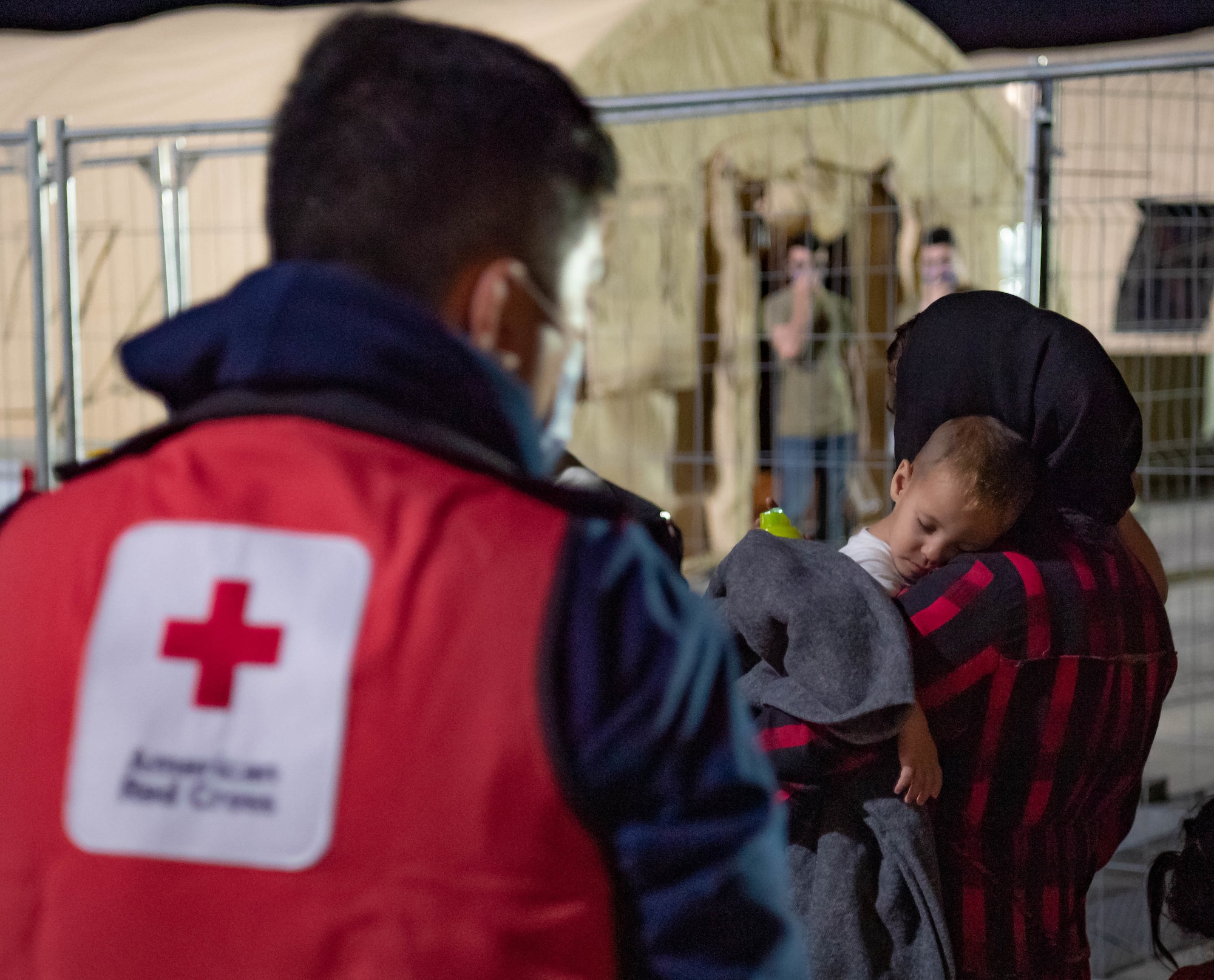 Red Cross volunteer provides support to evacuee