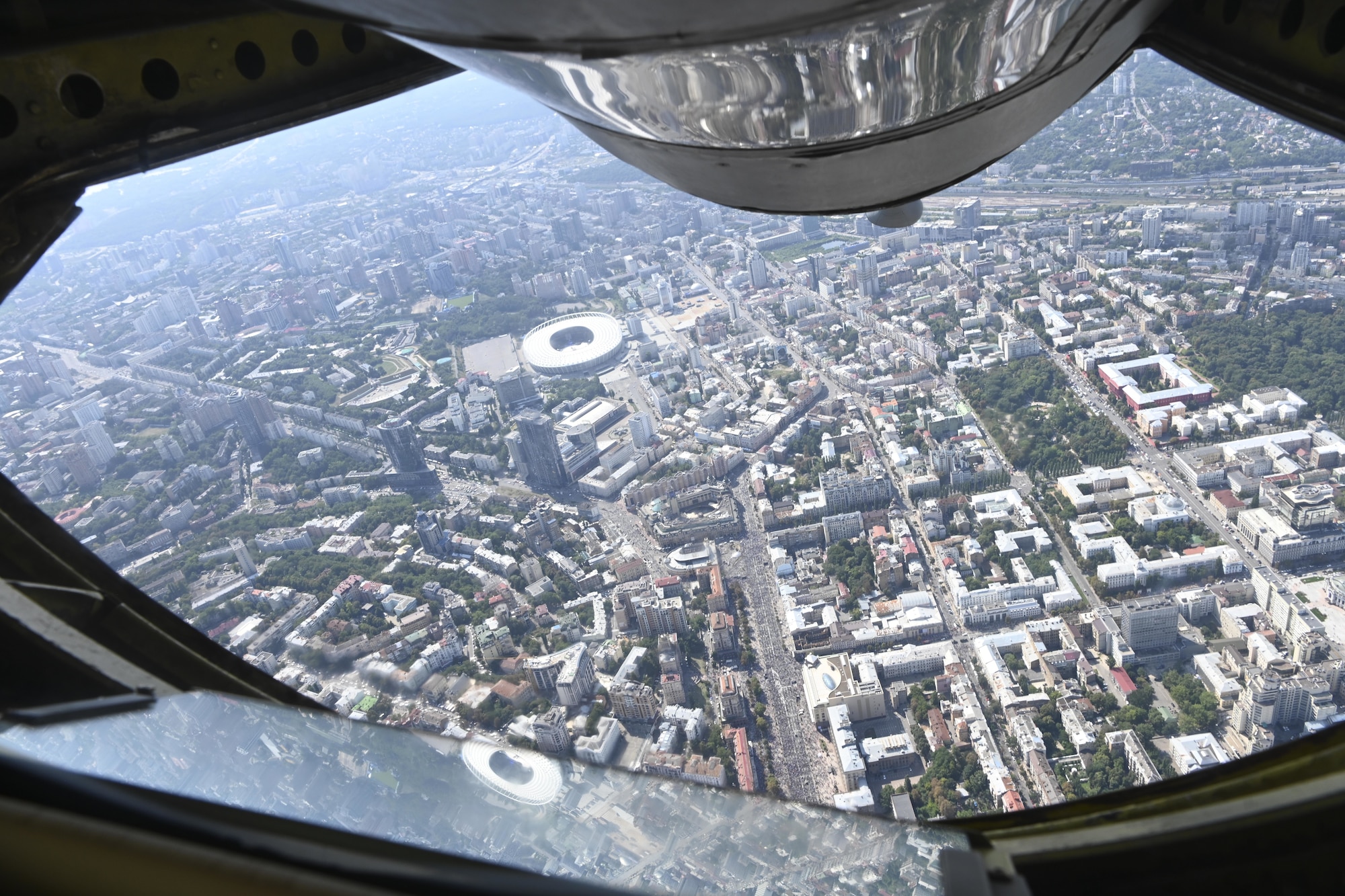 A U.S. Air Force KC-135 Stratotanker aircraft assigned to the 100th Air Refueling Wing, Royal Air Force Mildenhall, England, flies over Kyiv, Ukraine, to commemorate the 30th anniversary of Ukrainian independence Aug, 24, 2021. U.S. forces in Europe remain engaged, postured and ready to respond to regional threats as they arise in support of a continent that is whole, free and at peace. (U.S. Air Force photo by Senior Airman Joseph Barron)