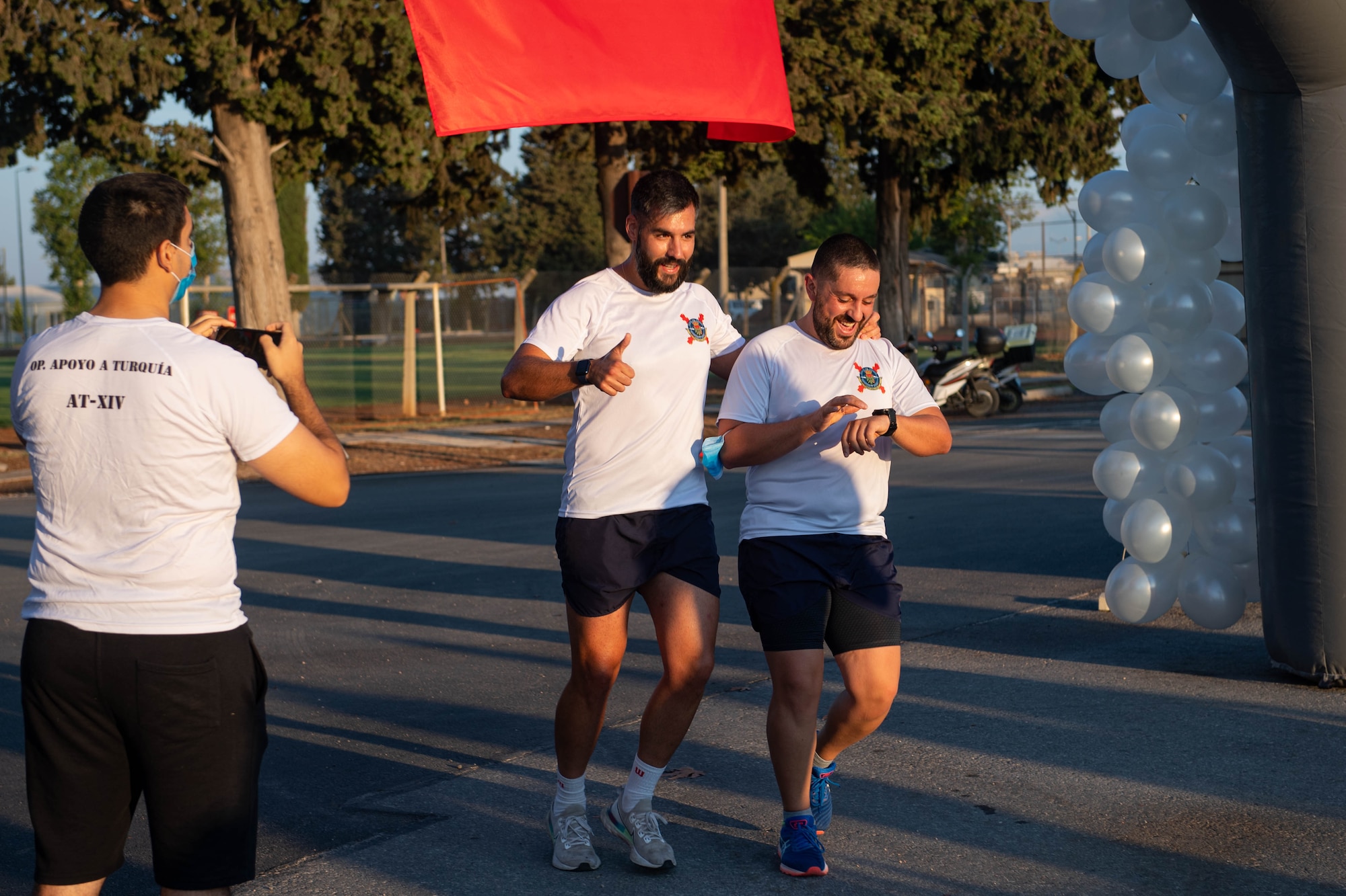 Runners crossing finish line