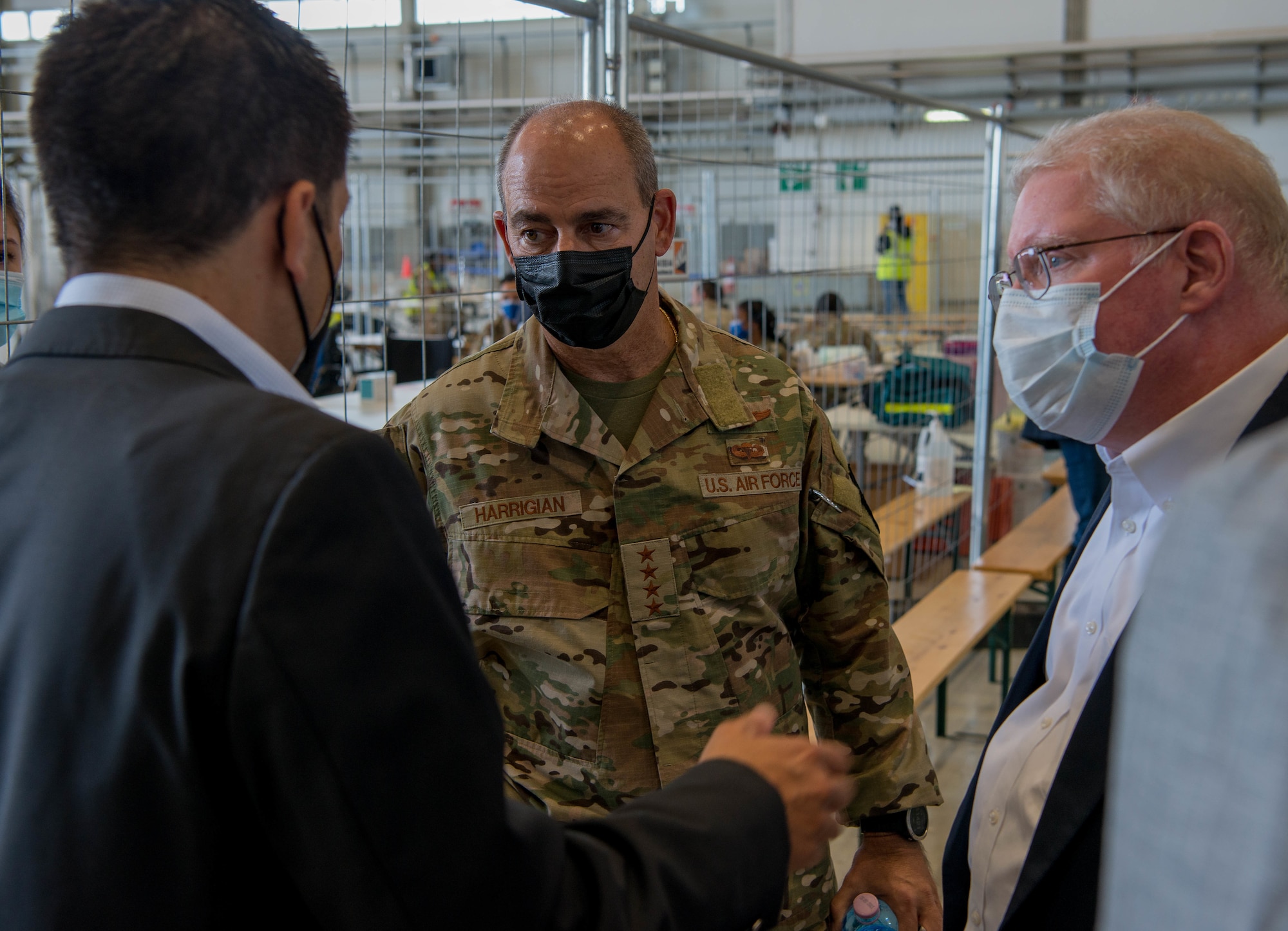 General speaks with Embassy officials.