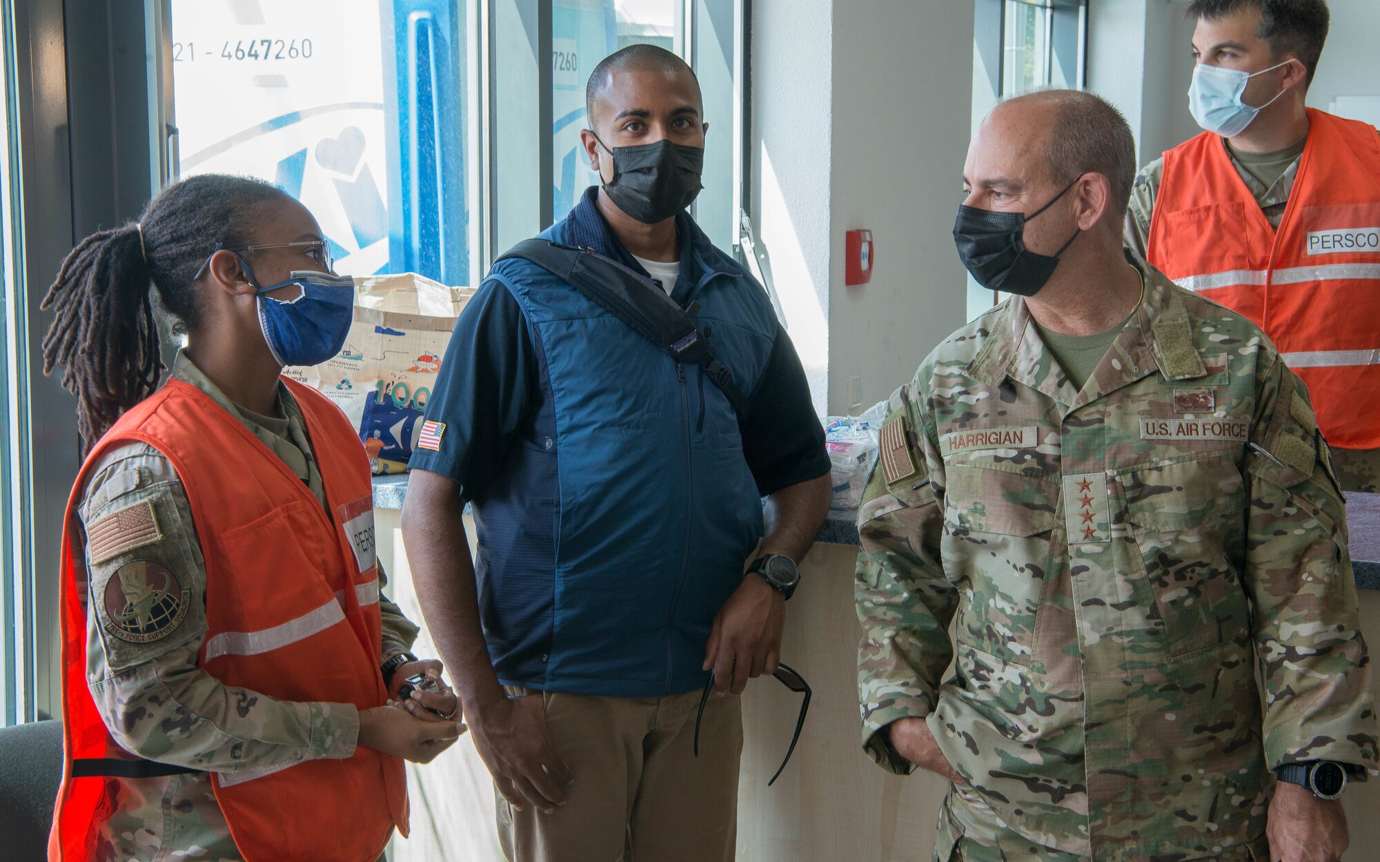 General speaks with personnel.