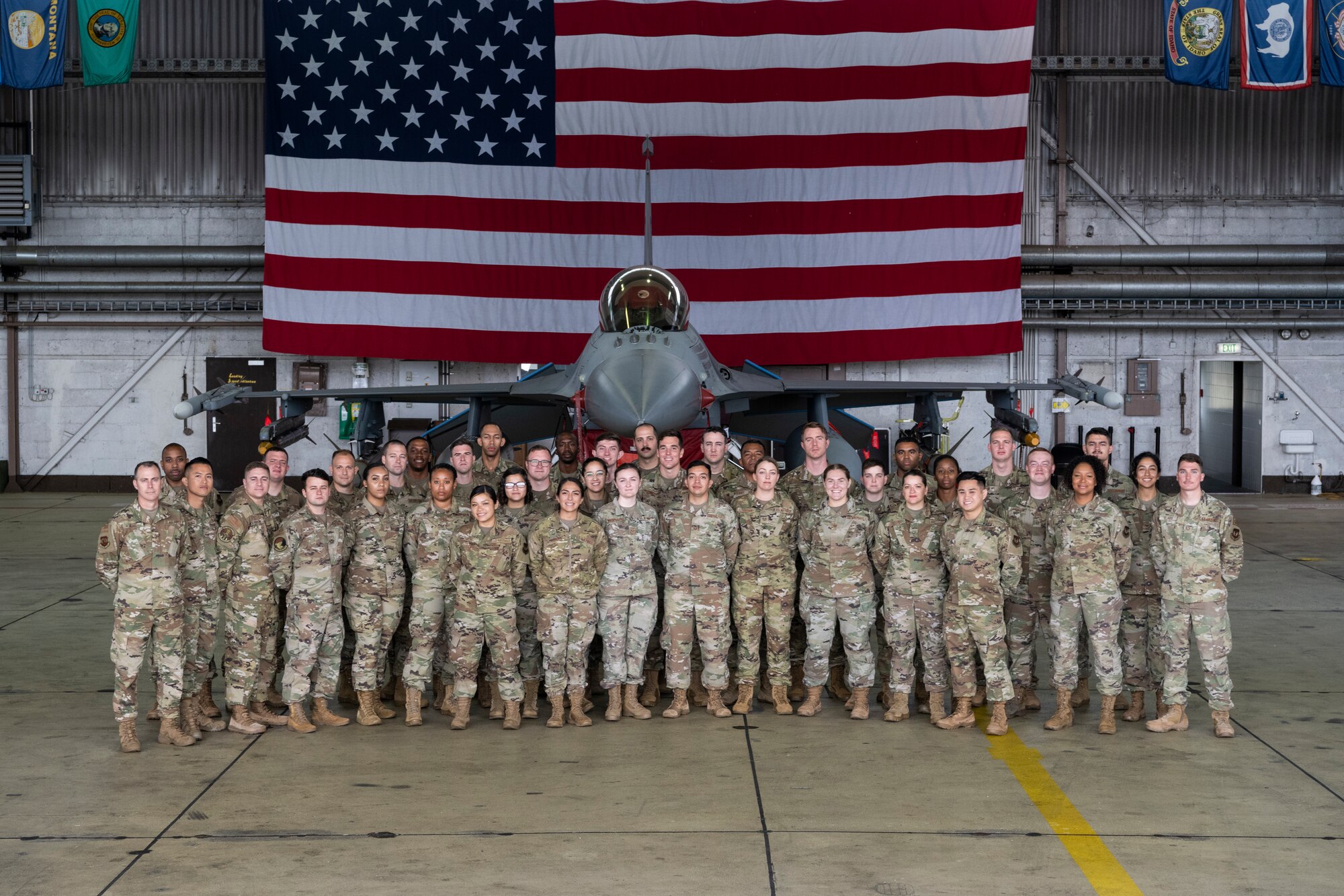 U.S. Air Force noncommissioned officers participating in the Atlantic Stripe Conference pose for a group photo during the conference on Spangdahlem Air Base, Germany, Aug. 19, 2021.