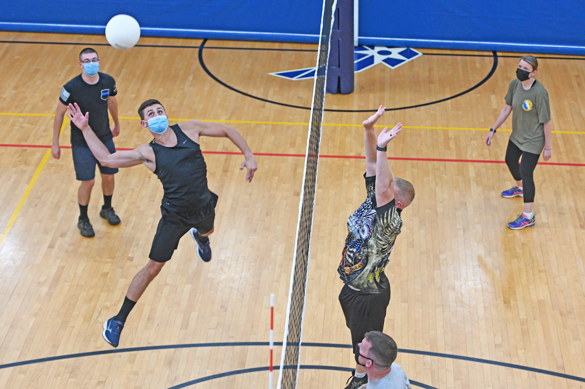 Airmen playing volleyball