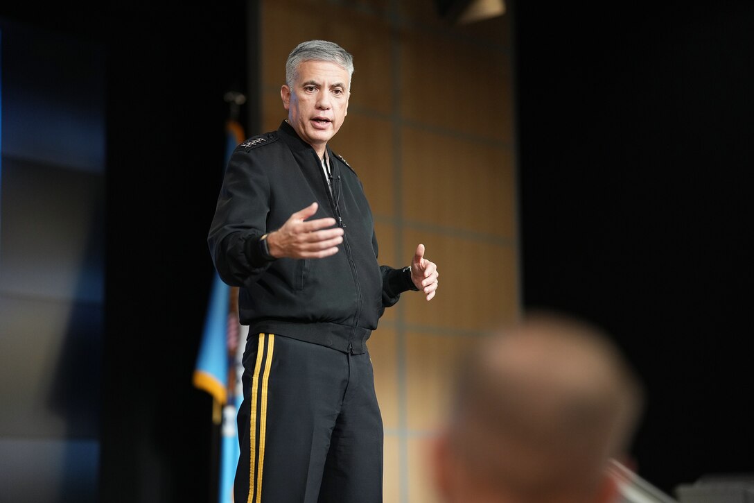 U.S. Army General Paul M. Nakasone, U.S. Cyber Command  commander and National Security Agency director, presents opening remarks for the 10th annual Reserve Component Summit at Fort George G. Meade, Md., Aug. 20, 2021.