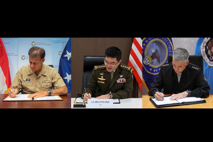 A Memorandum of Understanding concerning cooperation in cyberspace was signed by Commander of the United States (US) Indo-Pacific Command Admiral John Aquilino (left), Chief of Defence Force Lieutenant-General Melvyn Ong (centre) and Commander of the US Cyber Command General Paul Nakasone (right).