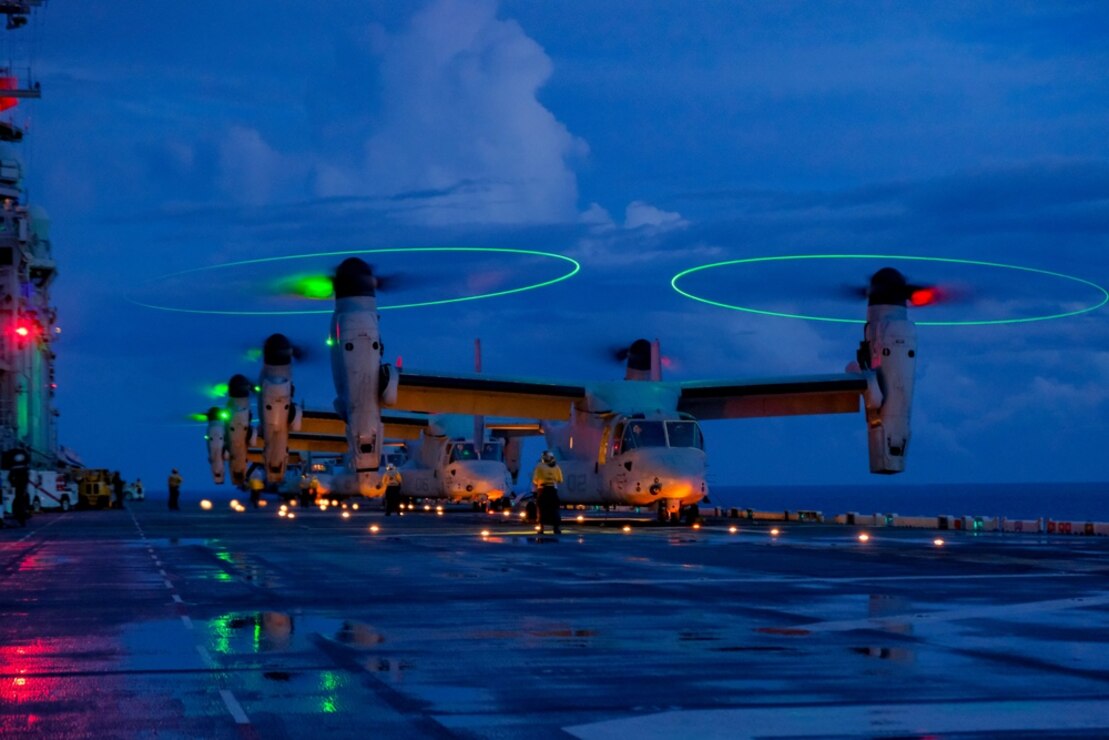 U.S. Marine Corps MV-22B’s with Marine Medium Tiltrotor Squadron 265, 31st Marine Expeditionary Unit, prepare for take-off aboard the amphibious assault ship USS America, in the Philippine Sea Aug. 17, 2021. The MV-22B provides combatant commanders with extended range and flexibility for a wide range of missions. The 31st MEU is operating aboard ships of America Expeditionary Strike Group in the 7th fleet area of operations to enhance interoperability with allies and partners and serve as a ready response force to defend peace and stability in the Indo-Pacific region.