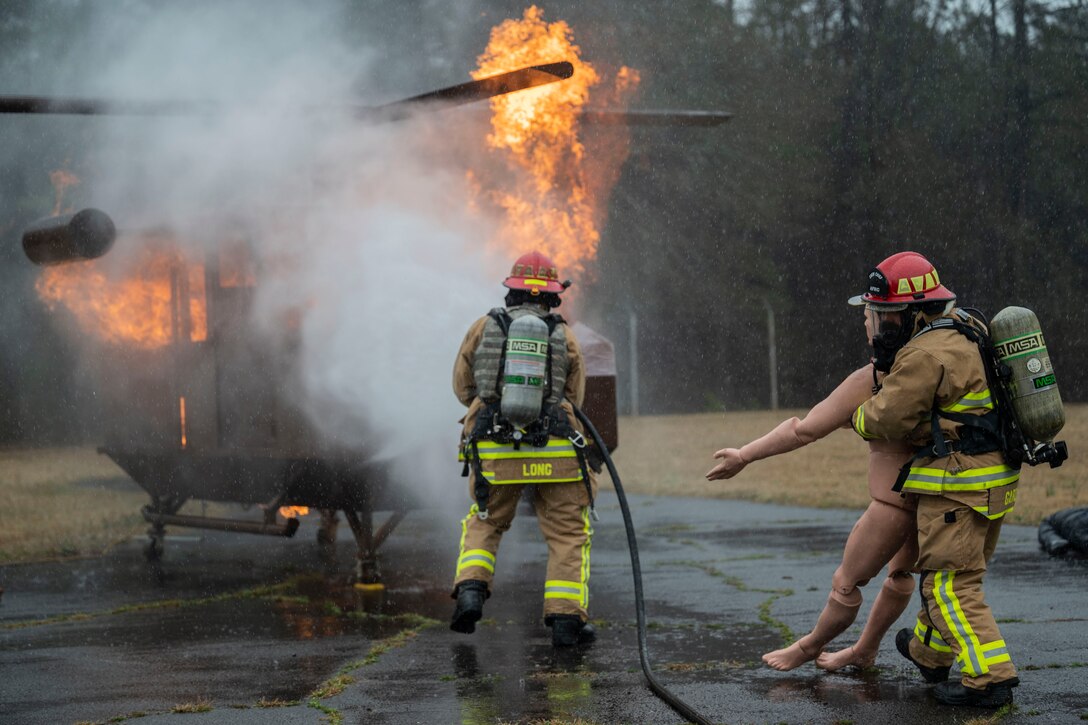 Citizen Airman, assigned to the 932nd Airlift Wing, Mission Support Group, participate in firefighter contingency training at Dobbins Air Force Base, Ga., March 18, 2021. The two week training culminated in three days filled with various types of fires and rescue calls. (U.S. Air Force Photo by Mr. Christopher Parr)
