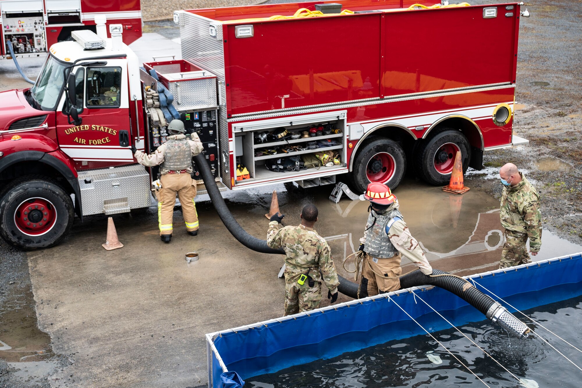 Citizen Airman, assigned to the 932nd Airlift Wing, Mission Support Group, participate in firefighter contingency training at Dobbins Air Force Base, Ga., March 18, 2021. The two week training culminated in three days filled with various types of fires and rescue calls. (U.S. Air Force Photo by Mr. Christopher Parr)