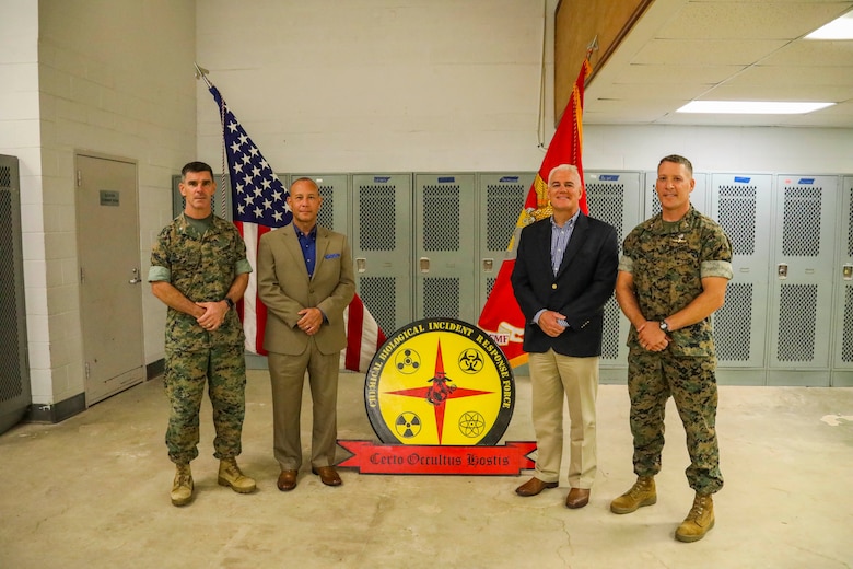 Indian Head, Maryland (July 30, 2021) – The Current and former Commanding officers of the Chemical Biological Incident Response Force (CBIRF), pose for a photo after the CBIRF change of command ceremony at Naval Support Facility Indian Head, Md. The ceremony signifies the transfer of command authority and responsibility from Riley to Col. Dean A. Schulz. (U.S. Marine Corps photo by SSgt Kristian S. Karsten/Released)