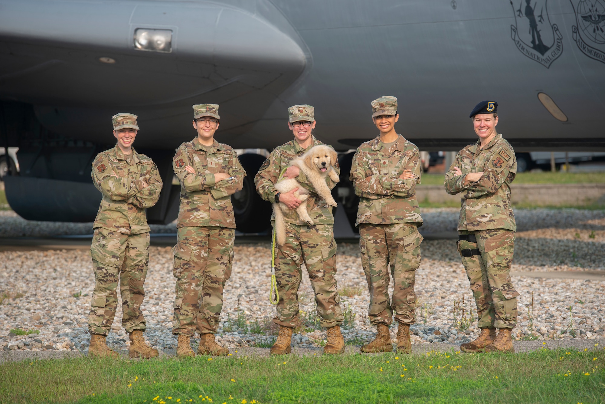 (From left to right) Staff Sgt. Victoria Nelson, 2nd Lt. Kirsten Arends, Maj. Shannon Van Splunder, Maj. Michelle Mastrobatista and Maj. Sherri Pierce, all of the 157th Air Refueling Wing, fill a variety of critical roles in planning for a sleek and exciting production of the Thunder Over New Hampshire Air Show, the first to be hosted by Pease Air National Guard base in a decade. (U.S. Air National Guard photo by Senior Master Sgt. Timm Huffman)