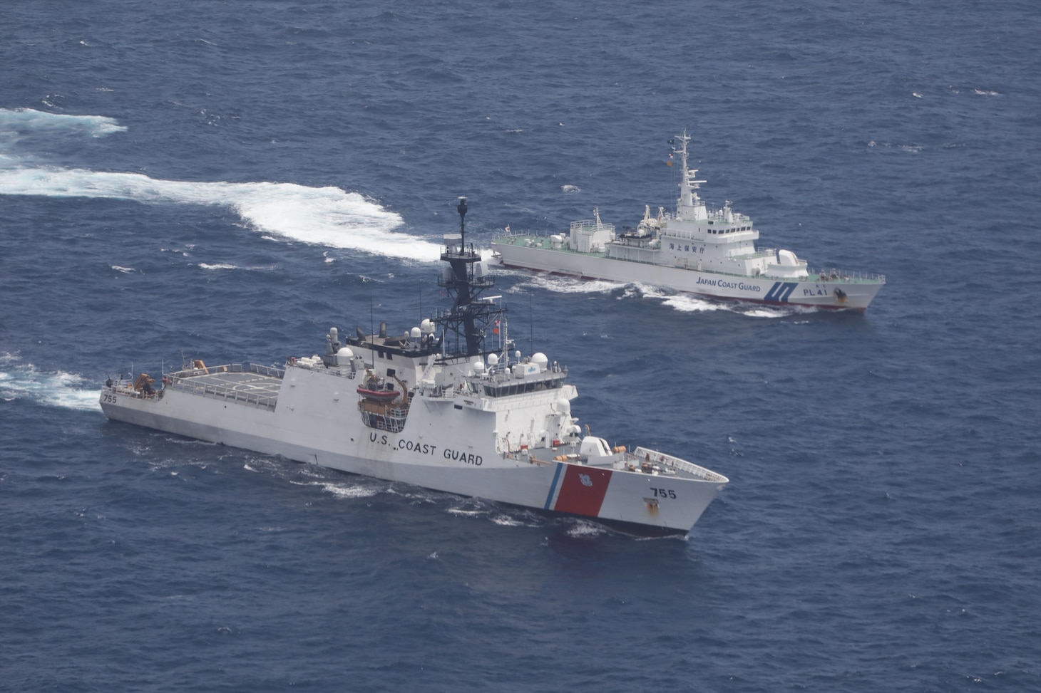 210826-N-MM501-1001 U.S. Coast Guard Cutter Munro and Japan Coast Guard Patrol Vessel Large Aso, transit together in formation during a maritime engagement in the East China Sea Aug. 25, 2021. U.S. Coast Guard members aboard the Munro deployed to the Western Pacific Ocean to strengthen alliances and partnerships and improve maritime governance and security in the region. (Photo courtesy of Japan Coast Guard)