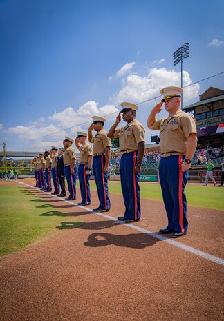 U.S. Marines with Recruiting Station Louisville, stand beside Hershel "Woody" Williams, center, retired Chief Warrant Officer and Medal of Honor recipient, during the opening ceremony of a military appreciation baseball game at Louisville Slugger Field in Louisville, Ky, Aug. 22, 2021. The Louisville Bats hosted the military appreciation baseball game to commemorate the fallen troops of the United States Armed Forces. (U.S. Marine Corps photo by Cpl. Leo Amaro)