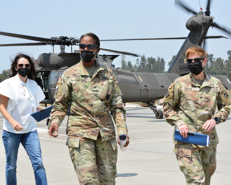 Col. Antoinette “Toni” Gant, commander of the Corps’ South Pacific Division, center; Cheree Peterson, SES, programs director, South Pacific Division, left; and Col. Julie Balten, LA District commander, right, arrive at Prado Dam Resident Office Aug. 24 in Corona, California.