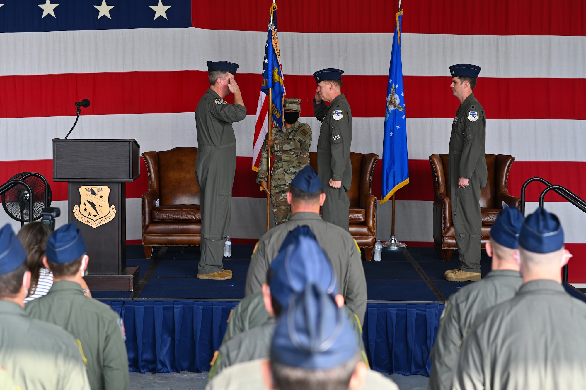 U.S. Air Force Col. Brent Drown, 340th Flying Training Group deputy commander, salutes Lt. Col. David Easterling, incoming 43rd Flying Training Squadron commander, during the 43th FTS Change of Command ceremony, Aug. 26, 2021, on Columbus Air Force Base, Miss. During wartime, or in the event of hostilities, the 43rd FTS is mobilized to offset anticipated losses of experienced active duty pilot contributions to the instructor pilot training programs. (U.S. Air Force photo by Senior Airman Jake Jacobsen)