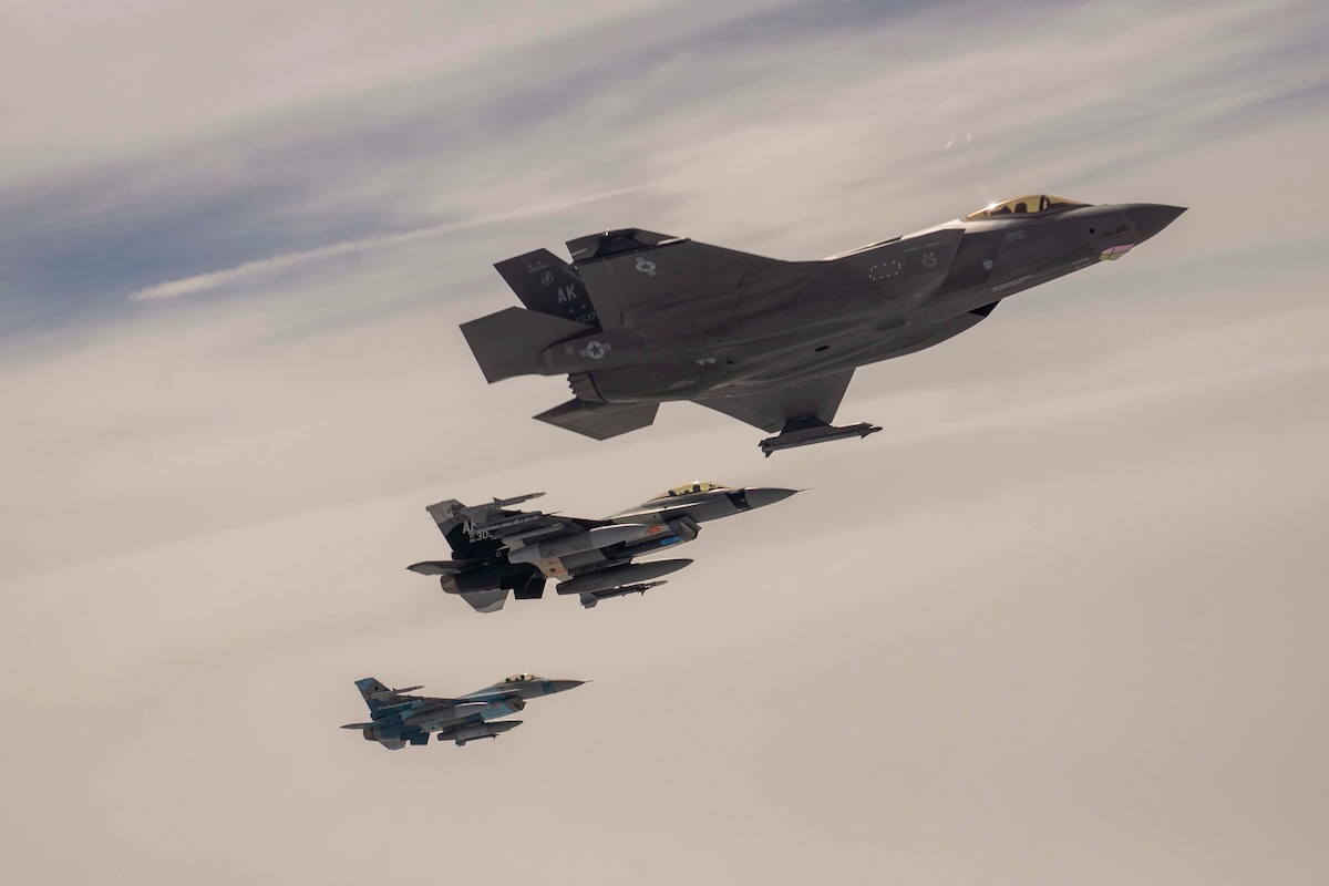 An F-35A Lightning II and two F-15 Fighting Falcons, assigned to the 354th Fighter Wing from Eielson Air Force Base, Alaska, flies above the Joint Pacific Alaska Range Complex, July 28, 2021. The F-35As participated in air refueling with the Alaska Air National Guard’s 168th Wing's KC-135R Stratotanker. (U.S. Air Force photo by Staff Sgt. Kaylee Dubois)