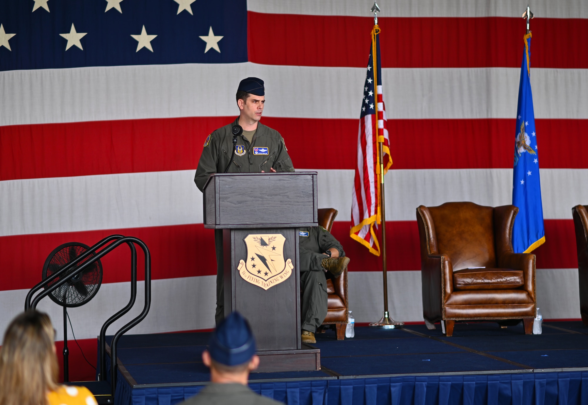 U.S. Air Force Lt. Col. Jason Barlow, 43rd Flying Training Squadron outgoing commander, gives his remarks at the 43rd FTS Change of Command ceremony at the Walker Center, Aug. 26, 2021, on Columbus Air Force Base, Miss. The 43rd Flying Training Squadron administers and executes the AETC/AFRC Associate Instructor Pilot (IP) Program and provides Active Guard Reserve (AGR) and Traditional Reserve (TR) IPs to augment the cadre of active duty pilots conducting pilot training. (U.S. Air Force photo by Senior Airman Jake Jacobsen)