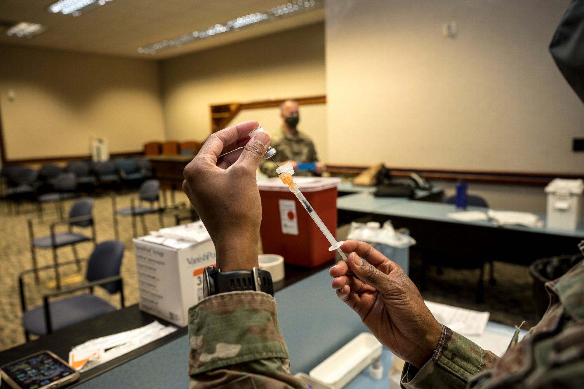 412th Medical Group begins to administer mandatory COVID-19 vaccinations at the Airman and Family Readiness Center on Edwards Air Force Base, California, Aug. 25. Secretary of Defense Lloyd J. Austin III issued a memorandum directing mandatory COVID-19 vaccinations for service members. John F. Kirby, Pentagon press secretary, said only Food and Drug Administration-approved vaccines will be mandatory. (Air Force photo by Katherine Franco)