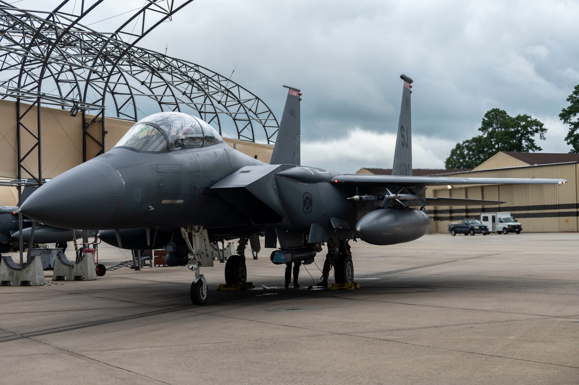 Aircrew members and maintainers from the 333rd Fighter Squadron perform a pre-flight check on an F-15E Strike Eagle at Seymour Johnson Air Force Base, North Carolina, August 4, 2021.