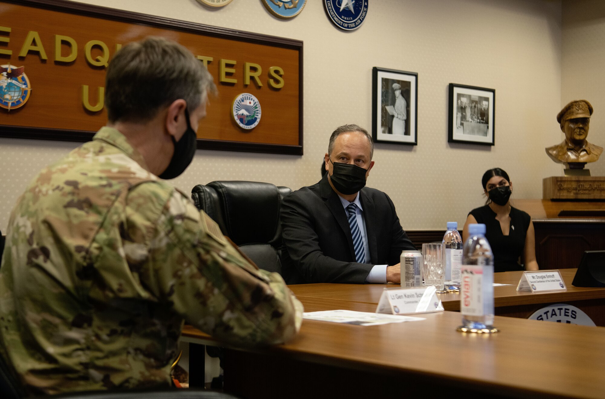 U.S. Air Force Lt. Gen. Kevin B. Schneider, U.S. Forces Japan commander, left, gives Second Gentleman of the United States, Douglas Emhoff a USFJ command briefing in the MacArthur Conference Room during his visit to Yokota Air Base, Japan, August 23, 2021. Emhoff visited Japan to familiarize himself with USFJ and its mission. (U.S. Air Force photo by Staff Sergeant Braden Anderson)