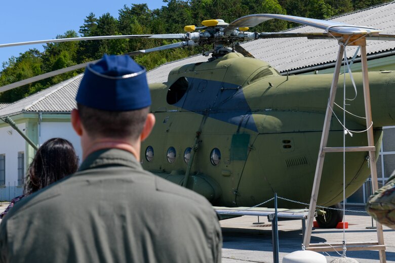 U.S. Air Force Lt. Col. Branden Felker, 31st Operational Support Squadron director of operations, looks at a helicopter at the Pivka Park of Military History in Pivka, Slovenia, Aug. 25, 2021. The museum is operated by the town of Pivka and the Slovenian Armed Forces and the exhibits illustrate history from World War II to the Cold War, the time frame of the former Socialist Federal Republic of Yugoslavia. (U.S. Air Force photo by Senior Airman Brooke Moeder)