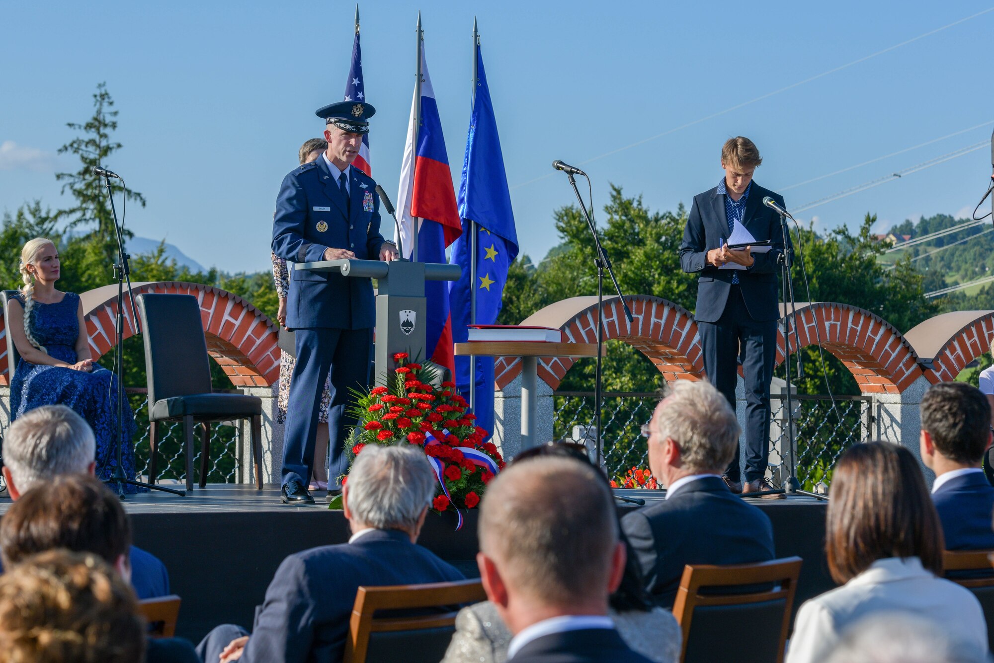 U.S. Air Force Brig. Gen. Jason E. Bailey, 31st Fighter Wing commander, speaks at the Andraž Memorial at Andraž nod Polzelo, Slovenia, Aug. 25, 2021. In 1944, the U.S. B-17 bomber ‘Dark Eyes’ was shot down over Andraž nod Polzelo and the memorial to ‘Dark Eyes’ was dedicated on March 22, 2014. ‘Dark Eyes’, part of the 96th Squadron, 2nd Bomber Group (Heavy), was on a mission to bomb the airdome at Klagenfurt, Austria, when it took on heavy flak, exploded, and went down. (U.S. Air Force photo by Senior Airman Brooke Moeder)