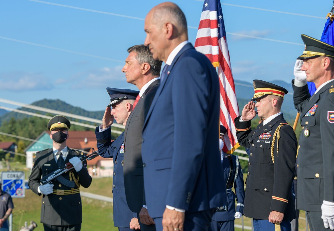 U.S. Air Force Brig. Gen. Jason E. Bailey, 31st Fighter Wing commander, left, Borut Pahor, Slovenian President of the Republic, middle, and Janez Jansa, Slovenian Prime Minister, right, commemorate a wreath dedicated to members with the U.S. B-17 bomber ‘Dark Eyes’ that was shot down in 1944 in Andraž nod Polzelo, Slovenia, Aug. 25, 2021. ‘Dark Eyes’, part of the 96th Squadron, 2nd Bomber Group (Heavy), was on a mission to bomb the airdome at Klagenfurt, Austria, when it took on heavy flak, exploded, and went down. (U.S. Air Force photo by Senior Airman Brooke Moeder)