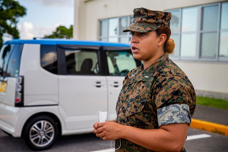 U.S. Marine Corps 1st Lt. Ashleigh Fairow, the Communication Strategy and Operations officer with Headquarters and Support Battalion, Marine Corps Installations Pacific, gives remarks to her Marines on Camp Foster, Okinawa, Japan, Aug. 27, 2021. A native of Jacksonville, North Carolina, Fairow became a commissioned officer in 2019 after earning a Bachelor of Science in English Studies and graduating from the U.S. Naval Academy at the age of 23. Her grandfather, retired Sgt. Ivor Griffin, enlisted in the Marine Corps in 1945, making history as he became one of the 20,000 African-Americans trained to become Marines at Montford Point Camp, Camp Lejeune, North Carolina. (U.S. Marine Corps photo by Lance Cpl. Alex Fairchild)