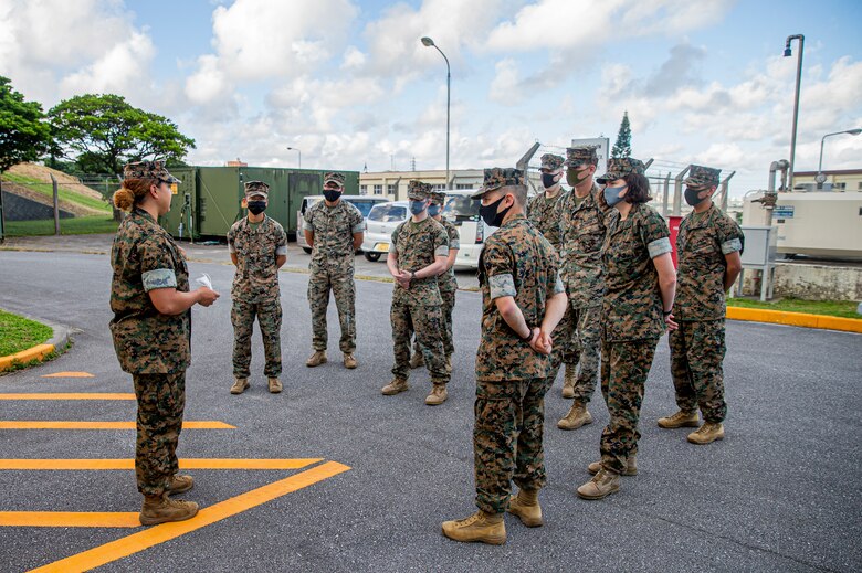 U.S. Marine Corps 1st Lt. Ashleigh Fairow, the Communication Strategy and Operations officer with Headquarters and Support Battalion, Marine Corps Installations Pacific, gives remarks to her Marines on Camp Foster, Okinawa, Japan, Aug. 27, 2021. A native of Jacksonville, North Carolina, Fairow became a commissioned officer in 2019 after earning a Bachelor of Science in English Studies and graduating from the U.S. Naval Academy at the age of 23. Her grandfather, retired Sgt. Ivor Griffin, enlisted in the Marine Corps in 1945, making history as he became one of the 20,000 African-Americans trained to become Marines at Montford Point Camp, Camp Lejeune, North Carolina. (U.S. Marine Corps photo by Lance Cpl. Alex Fairchild)