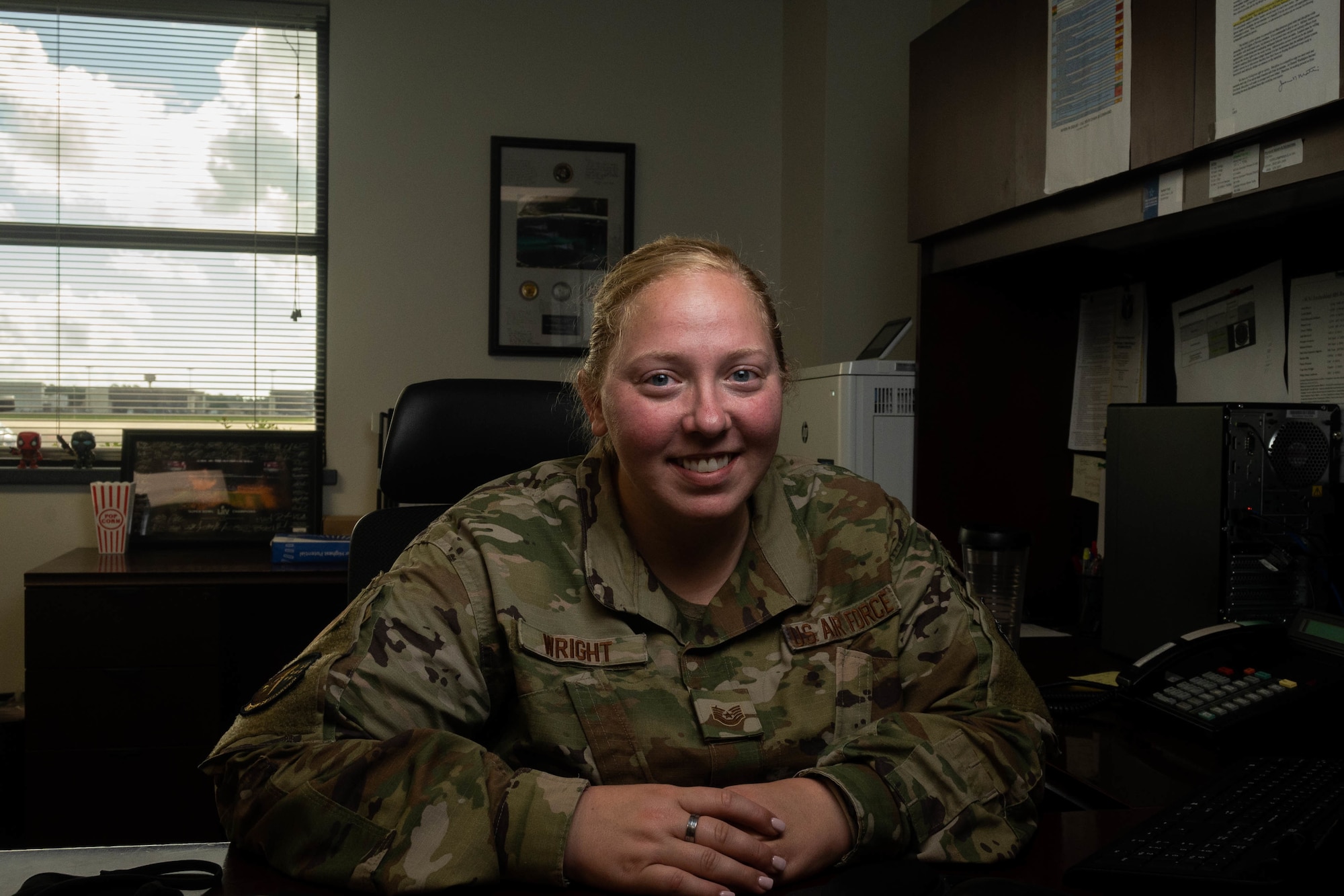 U.S. Air Force Tech. Sgt. Mandy Wright, a 23rd Special Operations Weather Squadron weather craftsman, pauses for a photo at Hurlburt Field, Florida, Aug. 19, 2021. Wright is responsible for monitoring storm systems, briefing prior to flying missions, and updating the wing commander on potential storm threats to base resources. U.S. Air Force photo by Staff Sgt. Rito Smith)