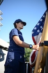EASTERN PACIFIC OCEAN – Seaman Apprentice Tatiana Muniz Guzman, a crewmember aboard the Coast Guard Cutter Sherman, stands ready to raise the morning colors, Jan. 9, 2017. Sherman, homeported in Honolulu, is on a counter narcotics mission in the Eastern Pacific Ocean. Cutters like Sherman routinely conduct operations from South America to the Bering Sea conducting alien migrant interdiction operations, domestic fisheries protection, search and rescue, counter-narcotics and other Coast Guard missions at great distances from shore keeping threats far from the U.S. mainland. (FOR RELEASE U.S. Coast Guard photo Chief Warrant Officer Allyson E.T. Conroy)