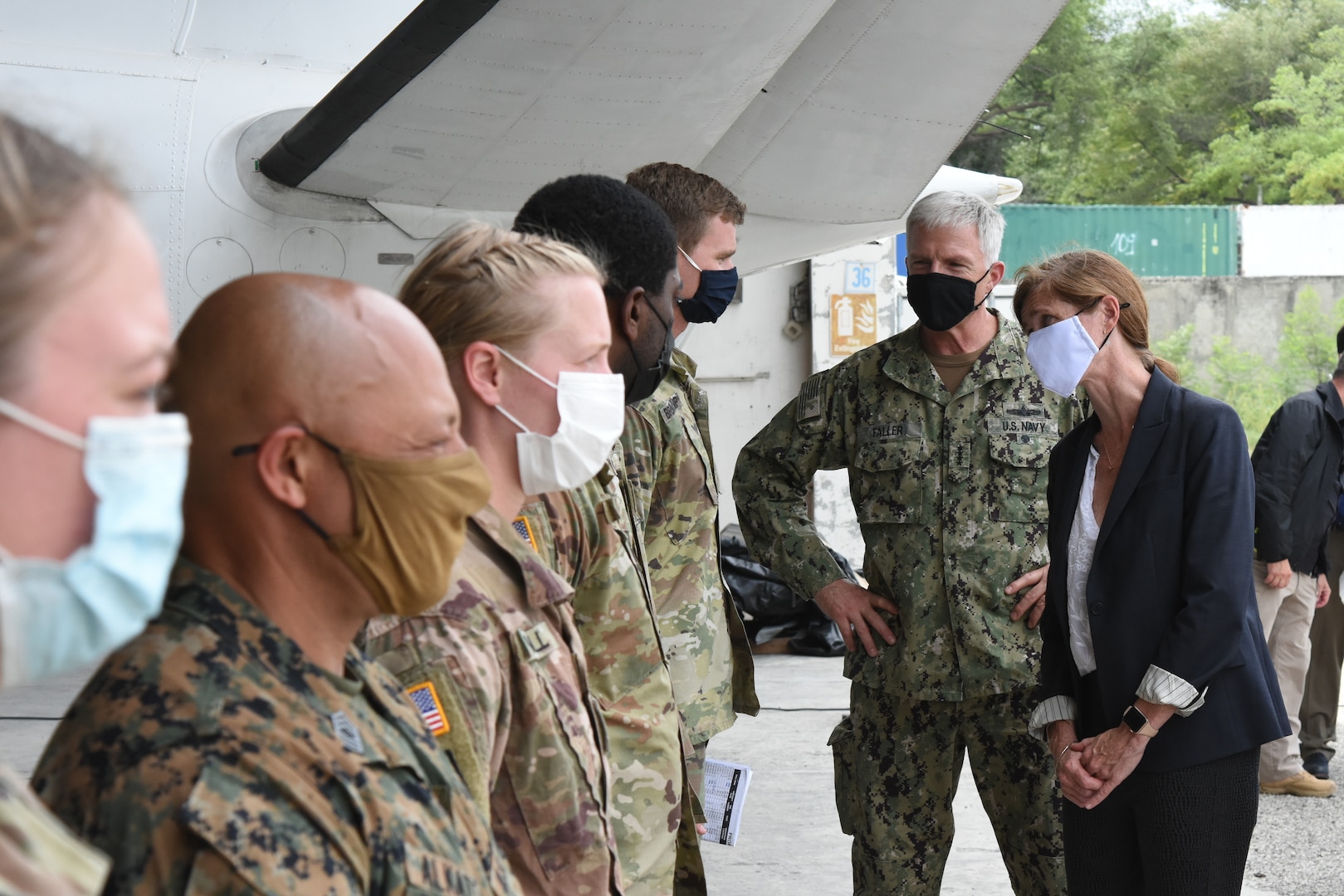Adm. Craig Faller, Commander of U.S. Southern Command, and Administrator Samantha Power with United States Agency for International Development, speak with soldiers from Joint Task Force-Haiti in Port-au-Prince, Haiti Aug. 26, 2021.