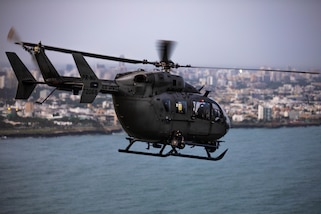 UH-72 helicopter from the Puerto Rico Army National Guard Aviation departs to Port-au-Prince, Haiti, Aug. 25, 2021.
