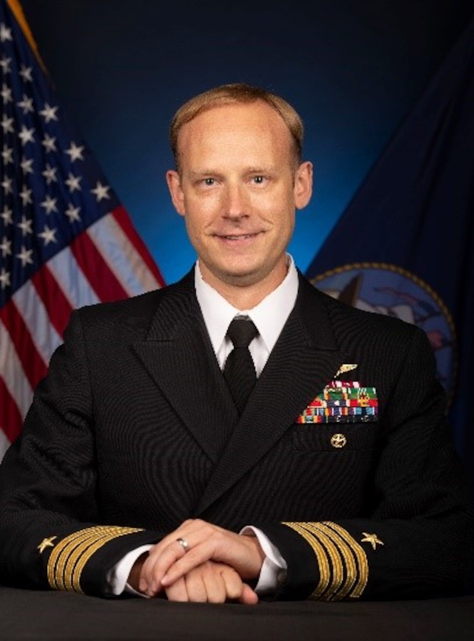 Official studio portrait of Capt. David Collins, Chief of Staff, Carrier Strike Group Twelve