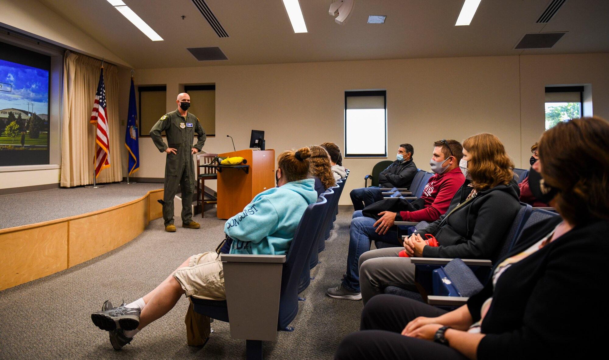 U.S. Air Force Col. Jeffrey Marshall, 92nd Air Refueling Wing vice commander, gives a unit mission brief to local educators prior to a teacher orientation flight on Fairchild Air Force Base, Washington, Aug. 24, 2021. The orientation flight consisted of 17 teachers spanning from 10 schools districts across the local community. (U.S. Air Force photo by Senior Airman Kiaundra Miller)