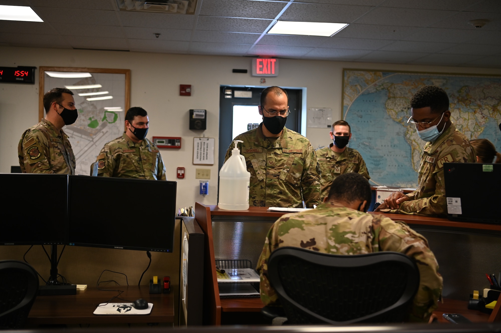 U.S. Airmen assigned to the 621st Contingency Response Group process through the Unit Deployment Manager's office Aug. 13, 2021, before departing from Joint Base McGuire-Dix-Lakehurst, New Jersey. The 621st CRW deployed Airmen from the 621st and 821st CRGs as well as the 621st Air Mobility Advisory Group to support the evacuation of American citizens, Special Immigration Visa applicants and other vulnerable Afghans from Afghanistan.  (U.S. Air Force photo by Tech. Sgt. Luther Mitchell Jr.)