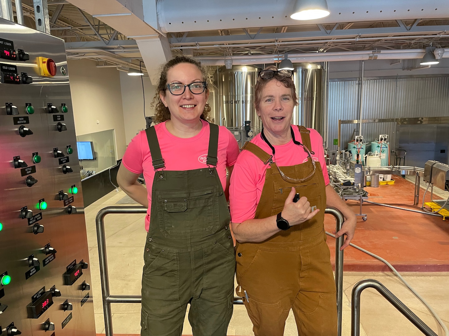 DLA Troop Support Future Operations Division Chief Mary Martin (right) stands next to Avery Hookey, a brewer at Iron Hill Brewery in Exton, Pa. Martin completed a three-week internship at the brewery to as part of a year and a half program in the science of brewing. Martin plans on brewing craft beer when she retires from Troop Support.