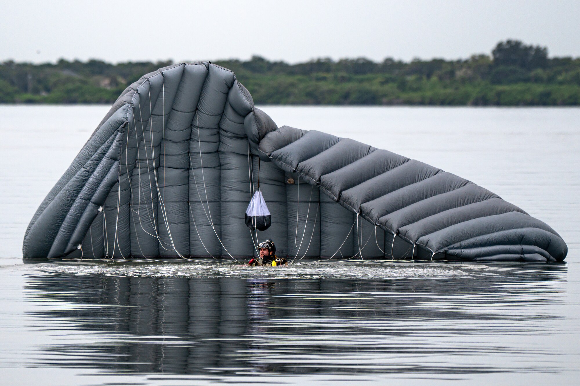 Photo of Airman swimming in water