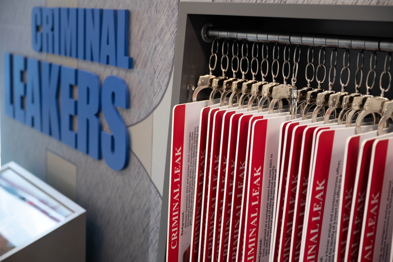 An exhibit displays handcuffs and criminals.