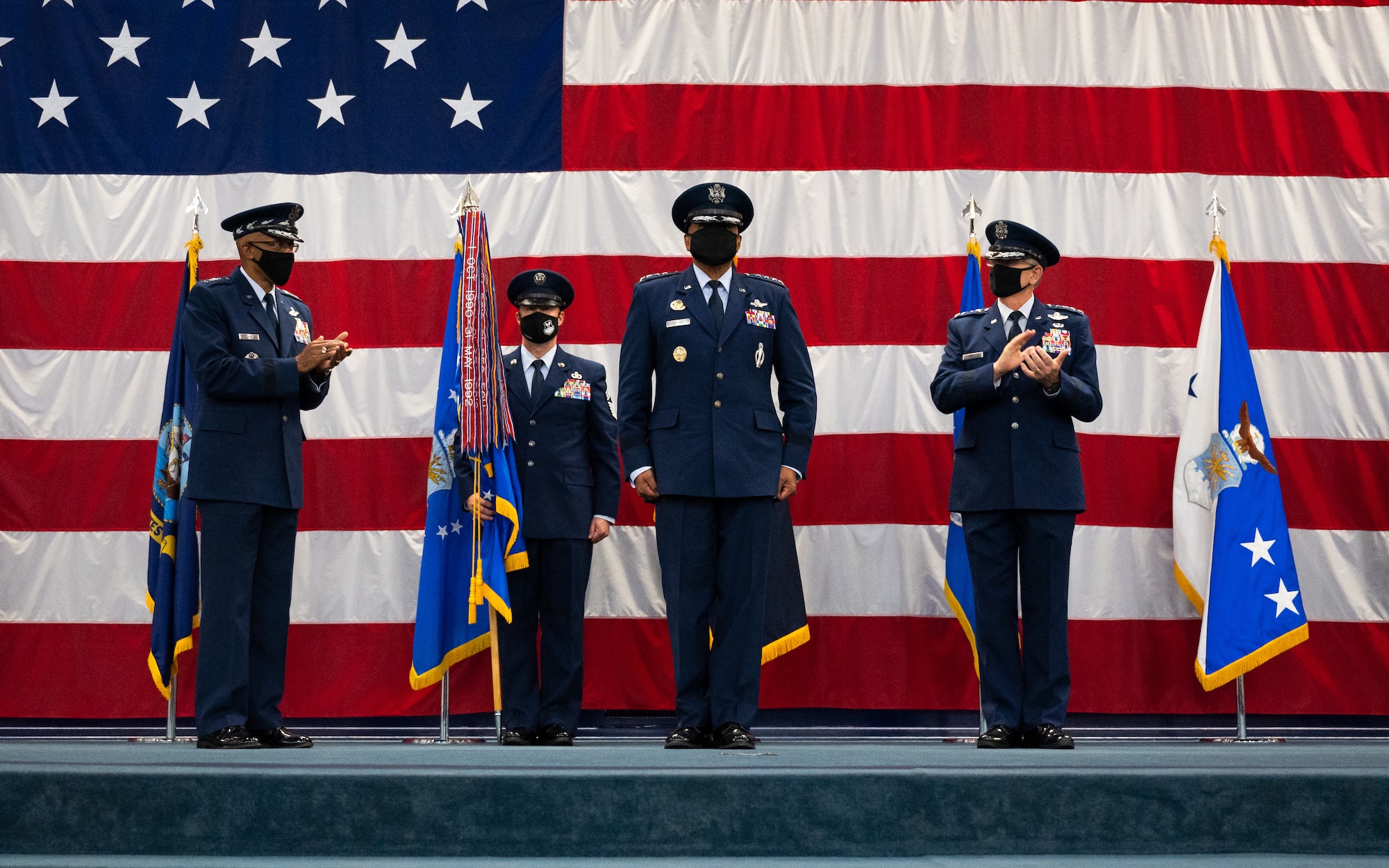 Gen. Anthony Cotton, incoming Air Force Global Strike Command commander, is congratulated by Air Force Chief of Staff Gen. CQ Brown, Jr., left, and Gen. Timothy Ray, right, outgoing AFGSC commander, during the AFGSC change of command ceremony at Barksdale Air Force Base, Louisiana, Aug. 27, 2021. Activated in 2009, AFGSC is responsible for the nation's three intercontinental ballistic missile wings, the Air Force’s entire bomber force, Air Force Nuclear Command, Control and Communications systems, and operational and maintenance support to organizations within the nuclear enterprise. (U.S. Air Force photo by Senior Airman Jacob B. Wrightsman)