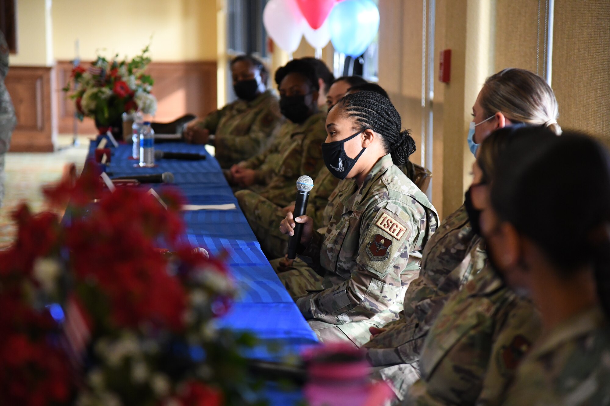 U.S. Air Force Senior Master Sgt. Veronica Logan, 336th Training Squadron first sergeant, delivers remarks while serving as a panel member during the Women's Equality Day Celebration inside the Bay Breeze Event Center at Keesler Air Force Base, Mississippi, Aug. 26, 2021. The event highlighted different perspectives of ongoing efforts to achieve women's equality. (U.S. Air Force photo by Kemberly Groue)