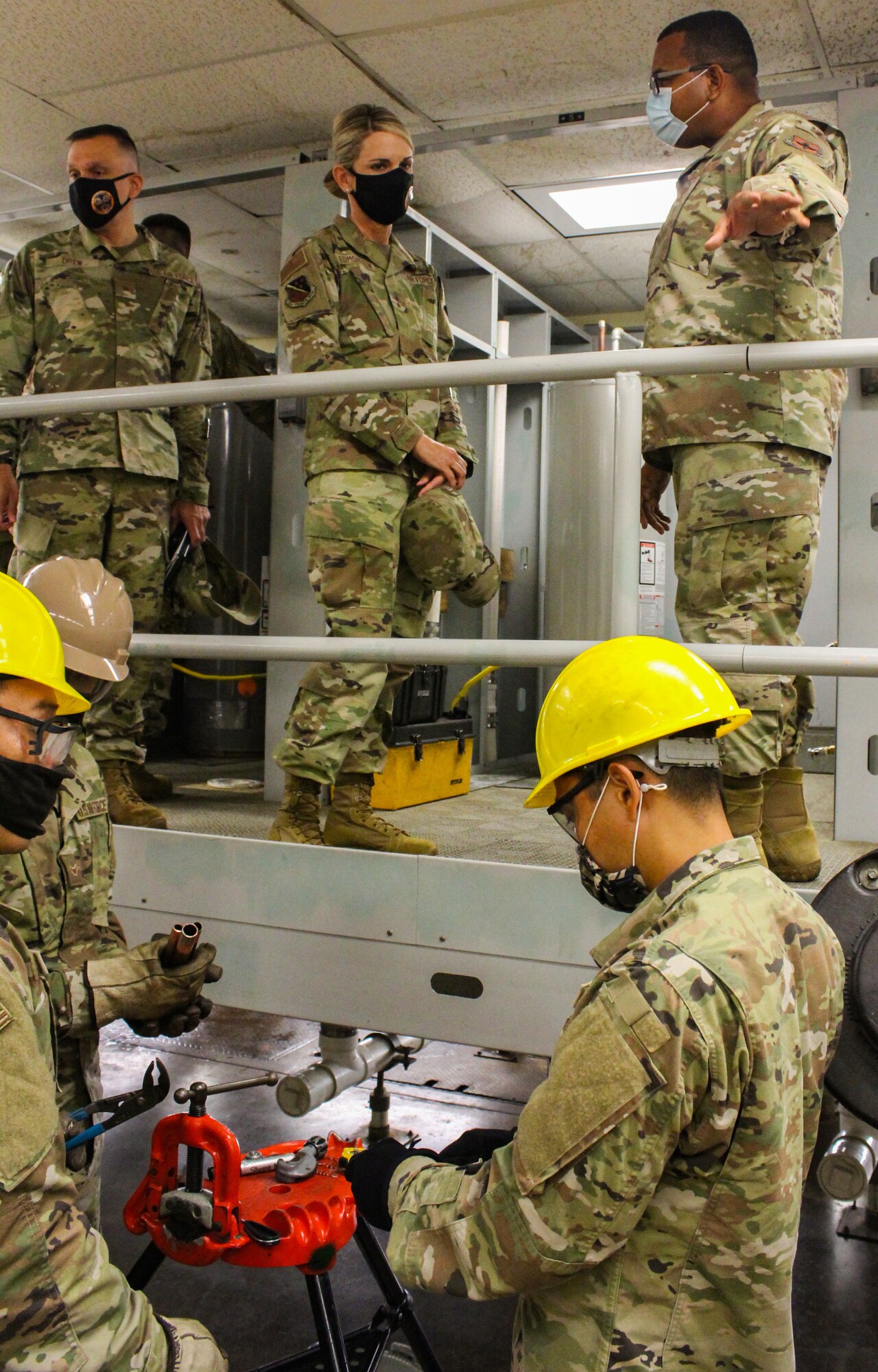 Master Sgt. Dwight Richards, left, talks to Maj. Gen. Michele C. Edmondson