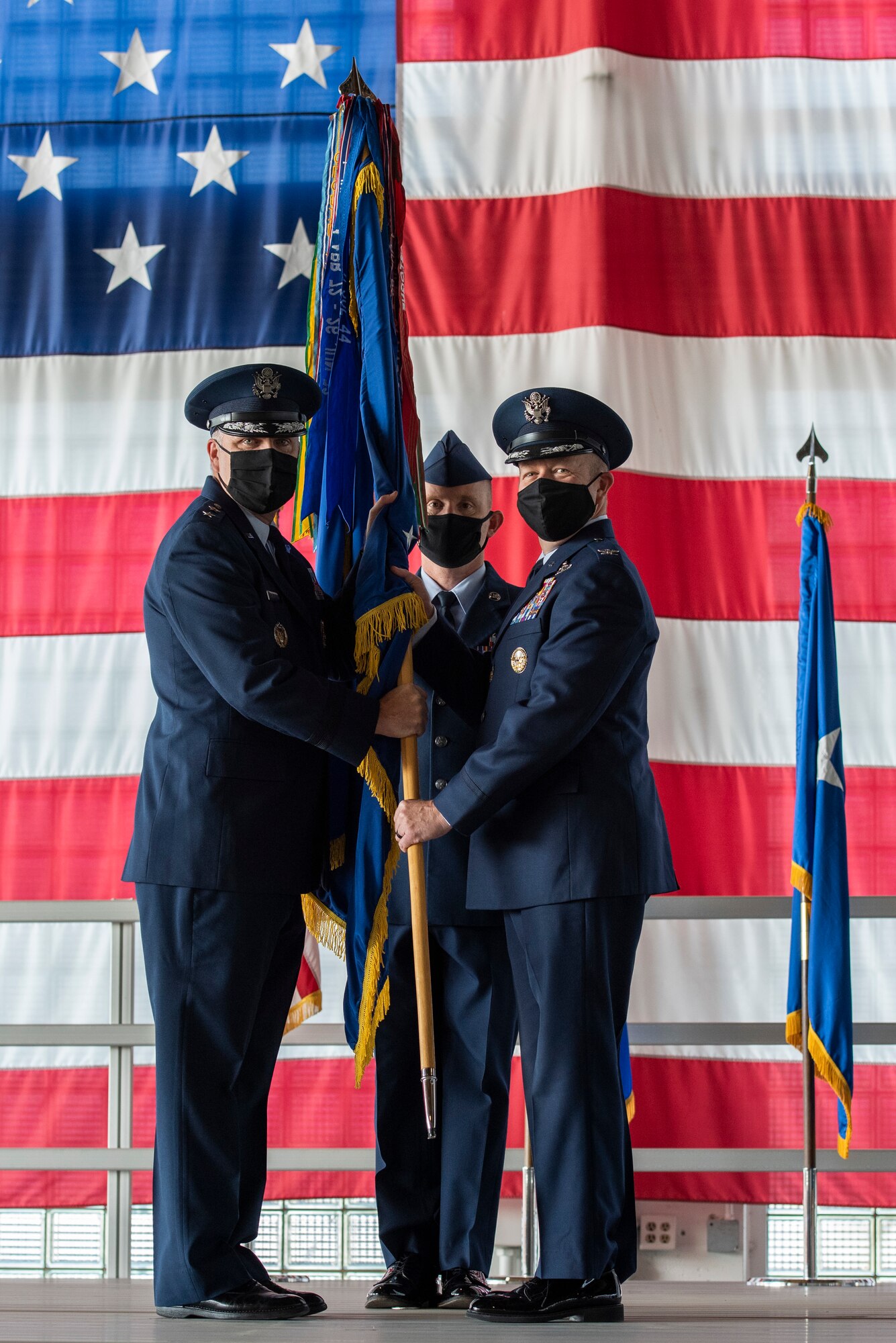 Maj. Gen. Michael G. Koscheski passes the guidon to Col. Ernesto M. DiVittorio.