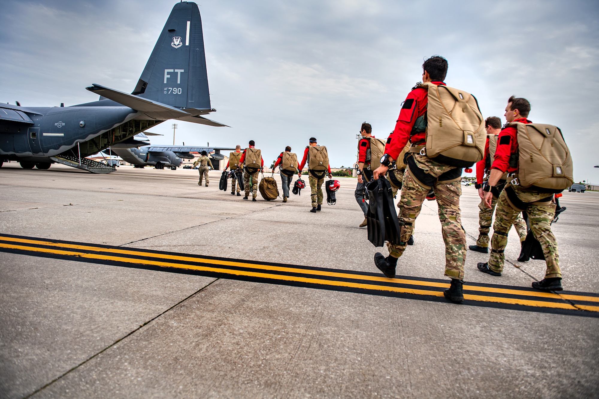 Photo of Airmen boarding an aircraft