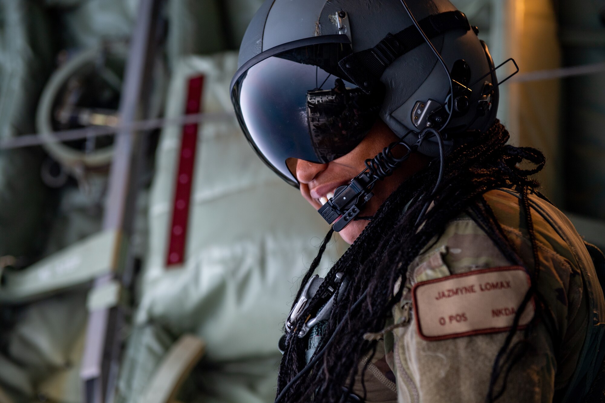 Photo of Airman working on aircraft